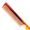 Hair comb with metal spike